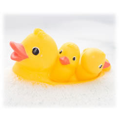 Photograph of a childs yellow ducks in the bath